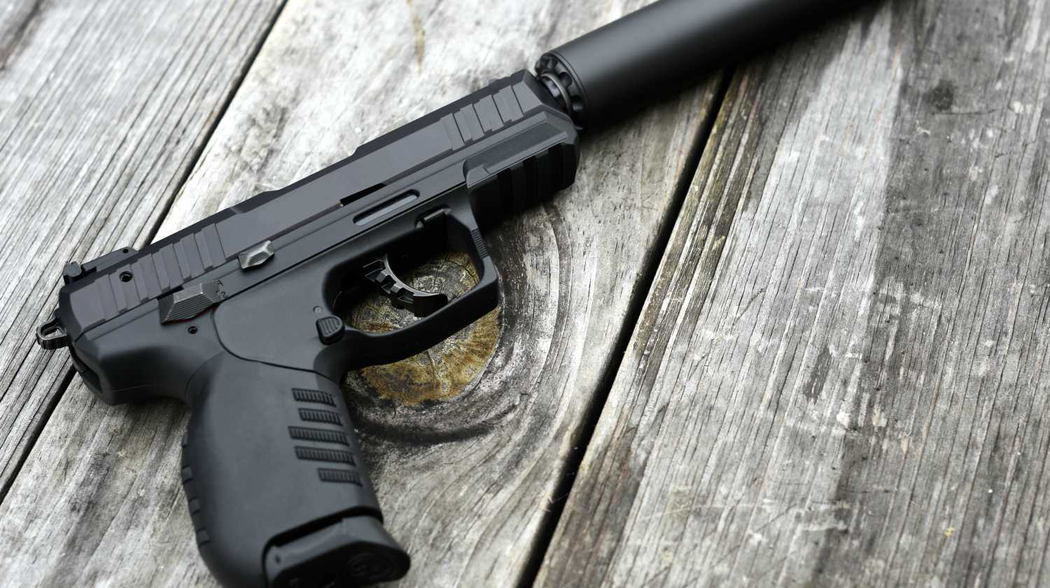 Feature | Black Handgun with silencer | Pistol Modifications You Need To Avoid | Gun Carrier