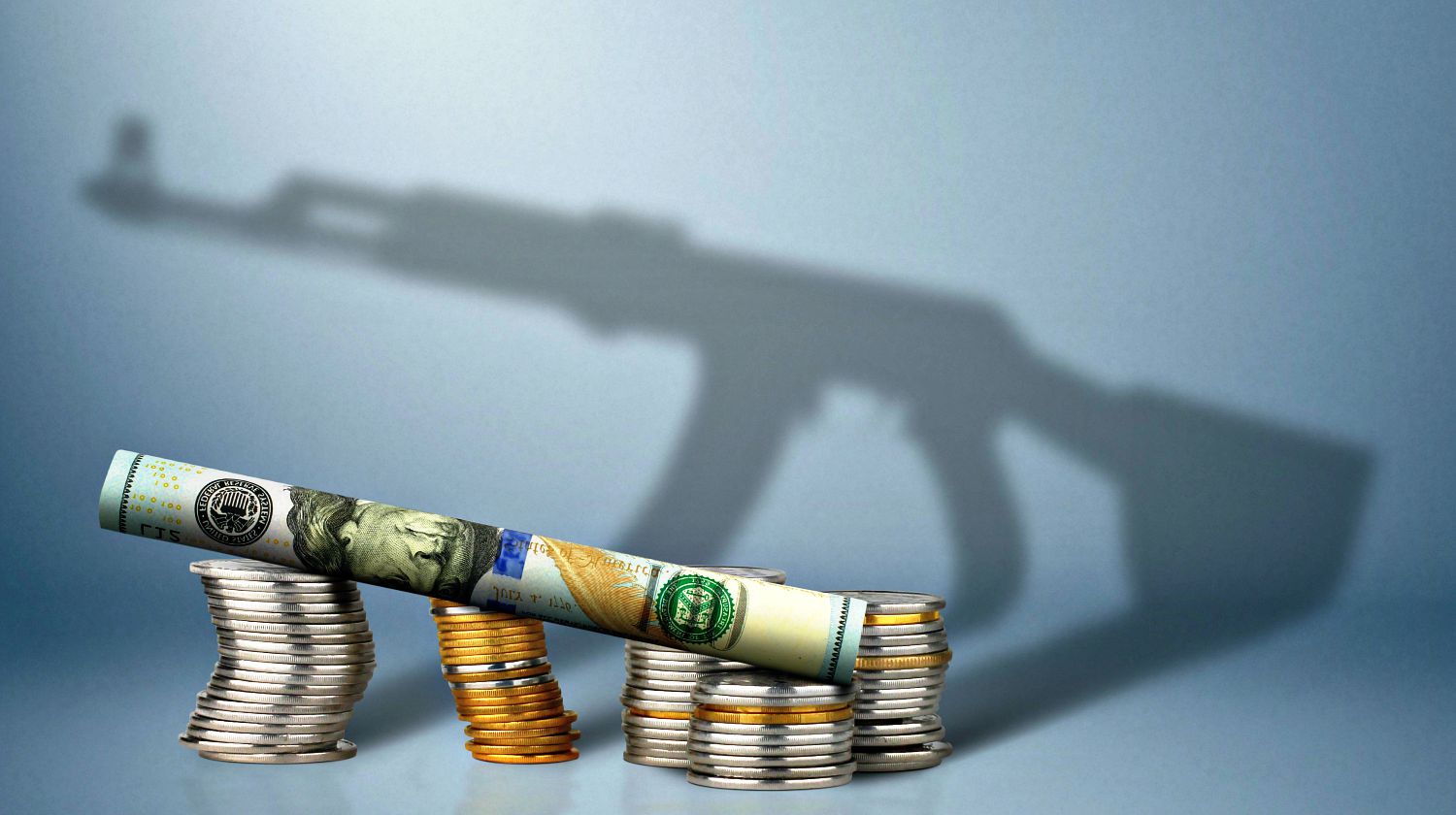 Money with gun shadow | Guns On A Budget | Buying Info | Featured