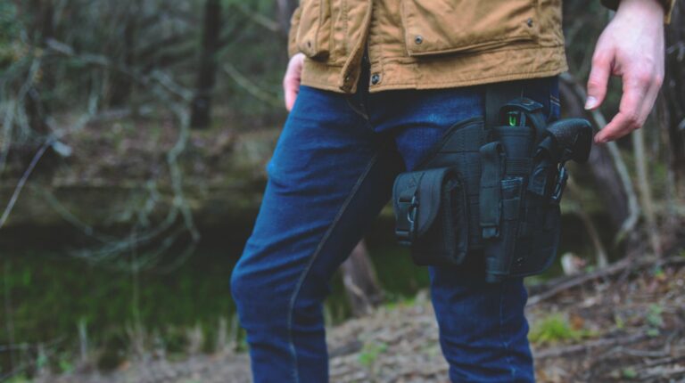 Feature | Man carrying gun | Why Carry A Gun: 5 Reasons Why And The 2nd Amendment