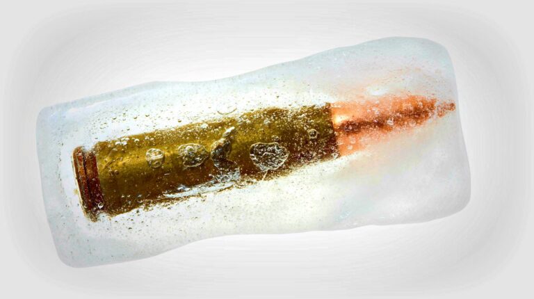 Feature | Bullet frozen in block of ice | Is It Possible To Create Ice Bullets And Fire Them?