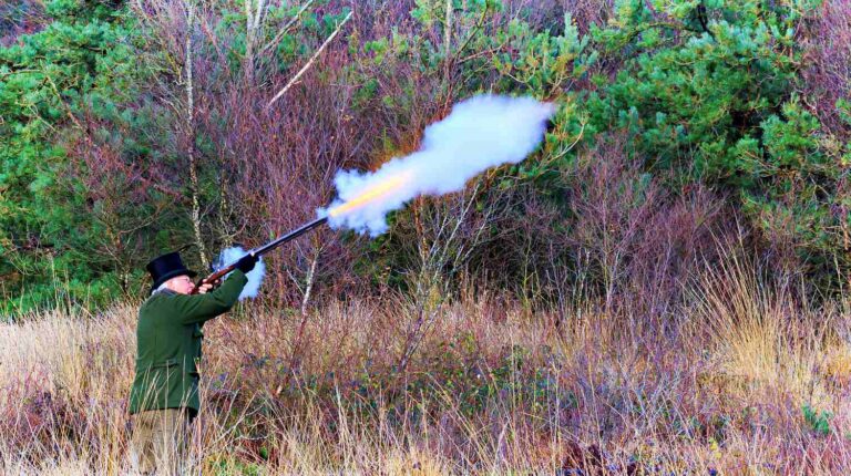 Feature | Gentleman wearing top hat rough shooting with a muzzel loading shot gun | Beretta 686 Silver Pigeon I | Gun Carrier Shotgun Reviews