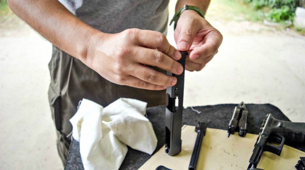 Feature | Man assemble his gun | How To Clean A Gun | Cleaning Tips & Tricks