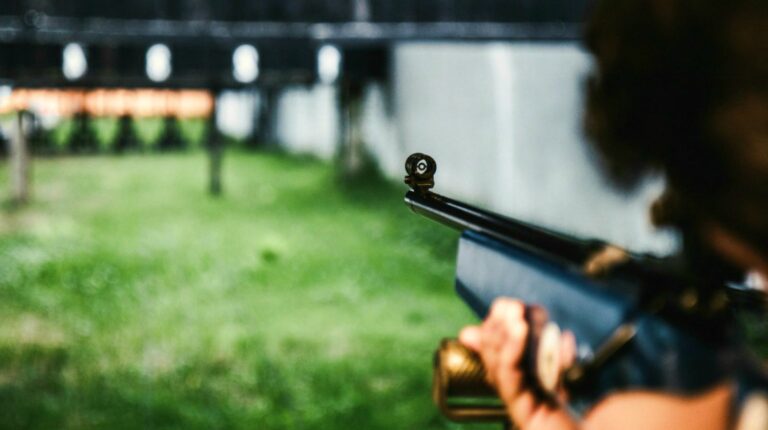 Feature | Man pointing gun on the target | Finding Your Norinco SKS Production Date