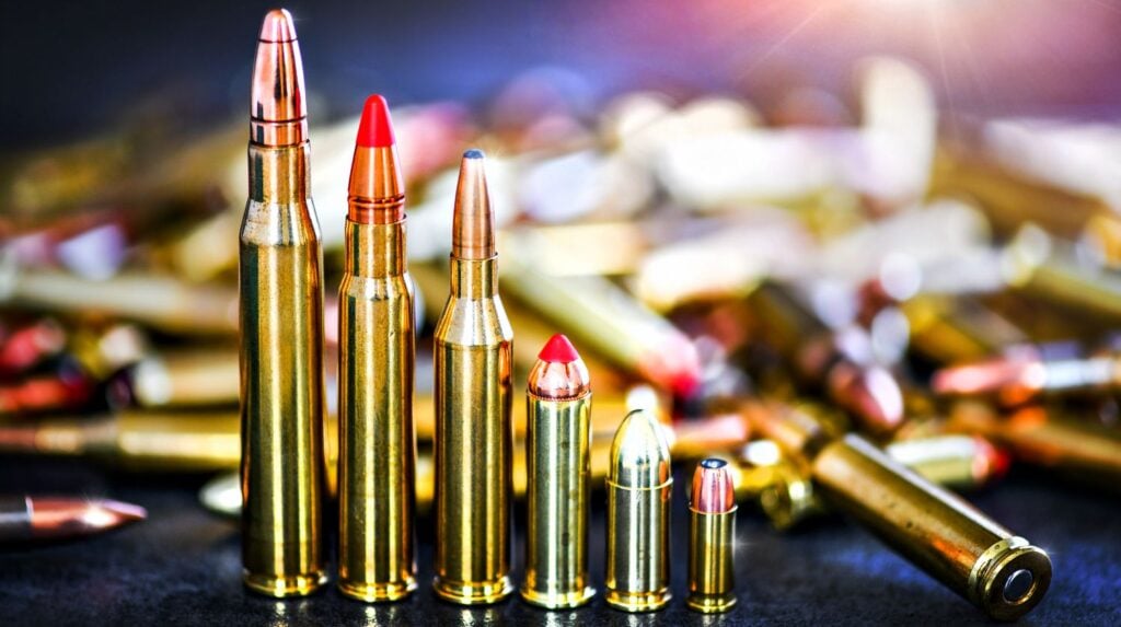 Various kind of bullets or ammo on stone table wide banner | Frangible Ammo For Defense Against Intruders Of All Kinds | Featured